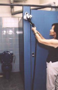 Bathroom stall cleaning with vapor steam